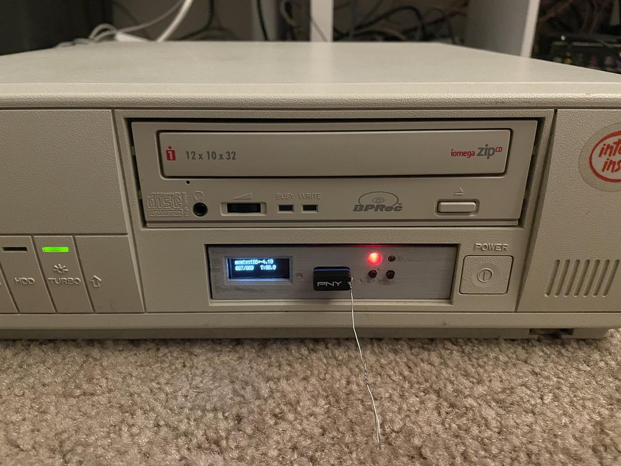 Gotek floppy emulator with OLED mod and 3D printed case, mounted in a Packard Bell desktop